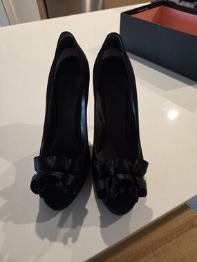 Nina Black Peep-Toe Pumps with Satin Ruffles